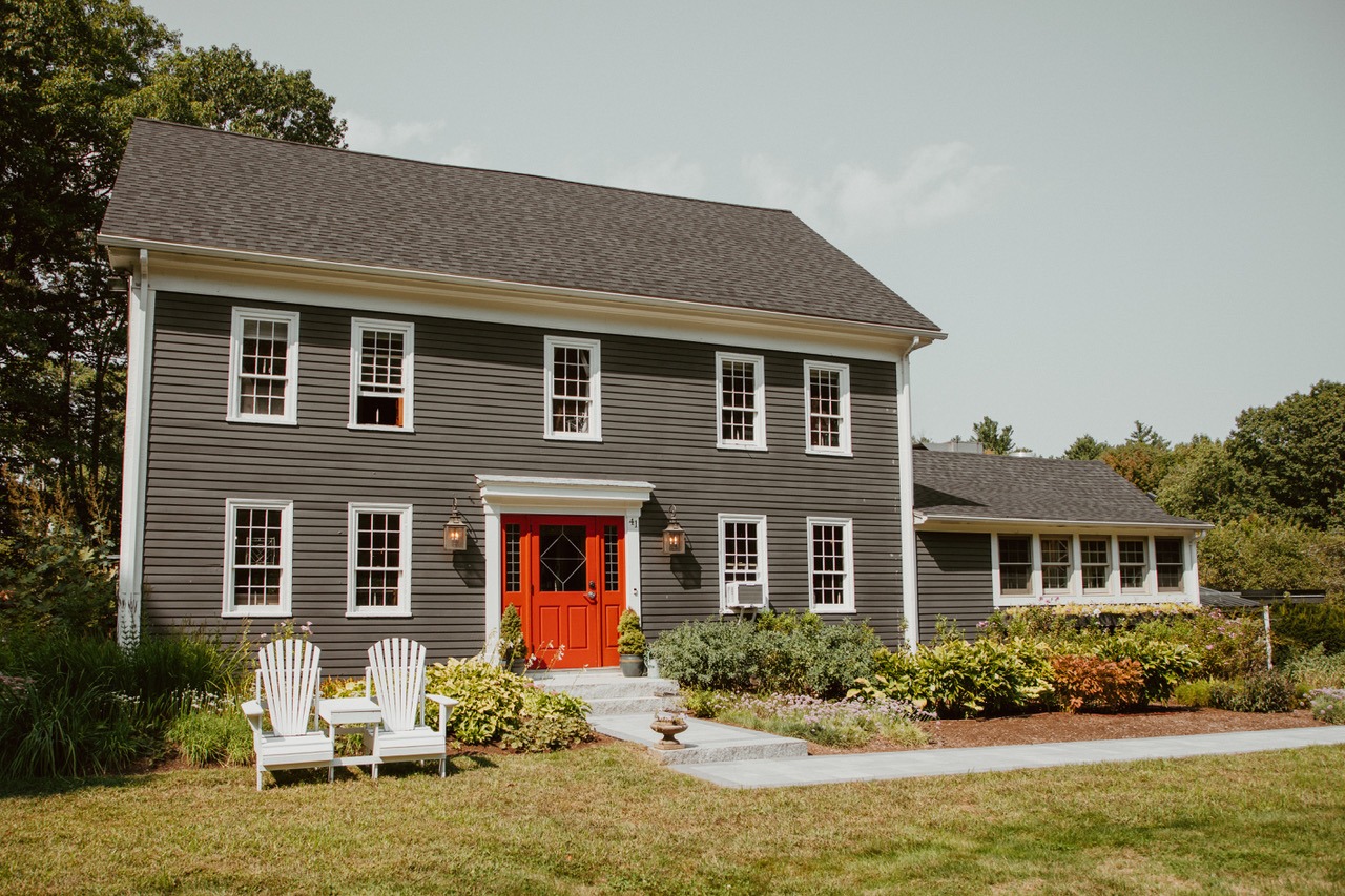 Arrowheads estate slate blue farm house in Maine