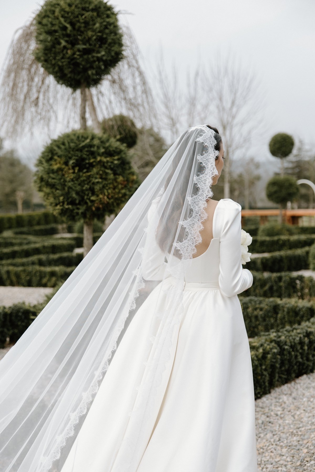 lace-trimmed cathedral length veil