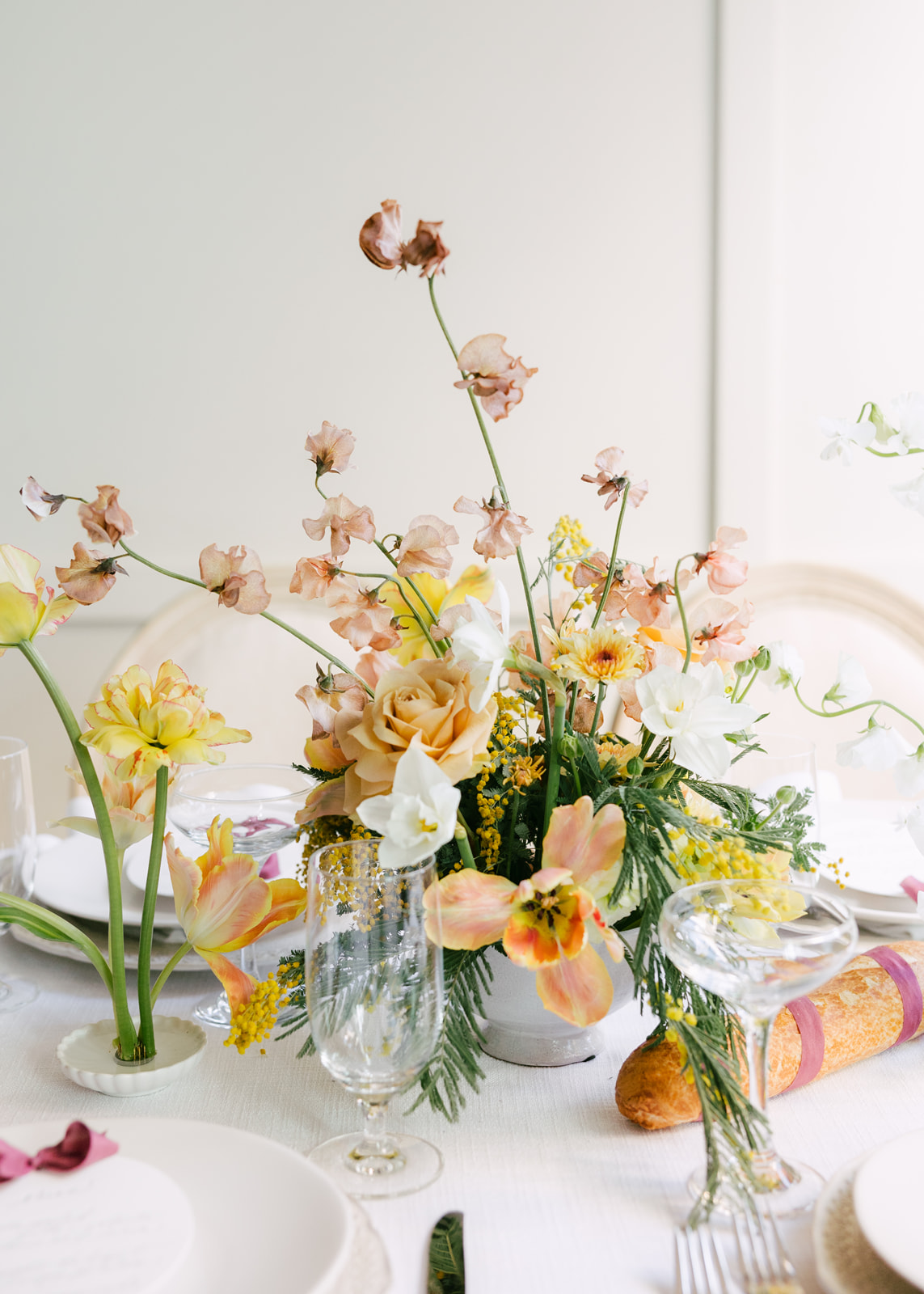 yellow and maroon wildflower centerpieces