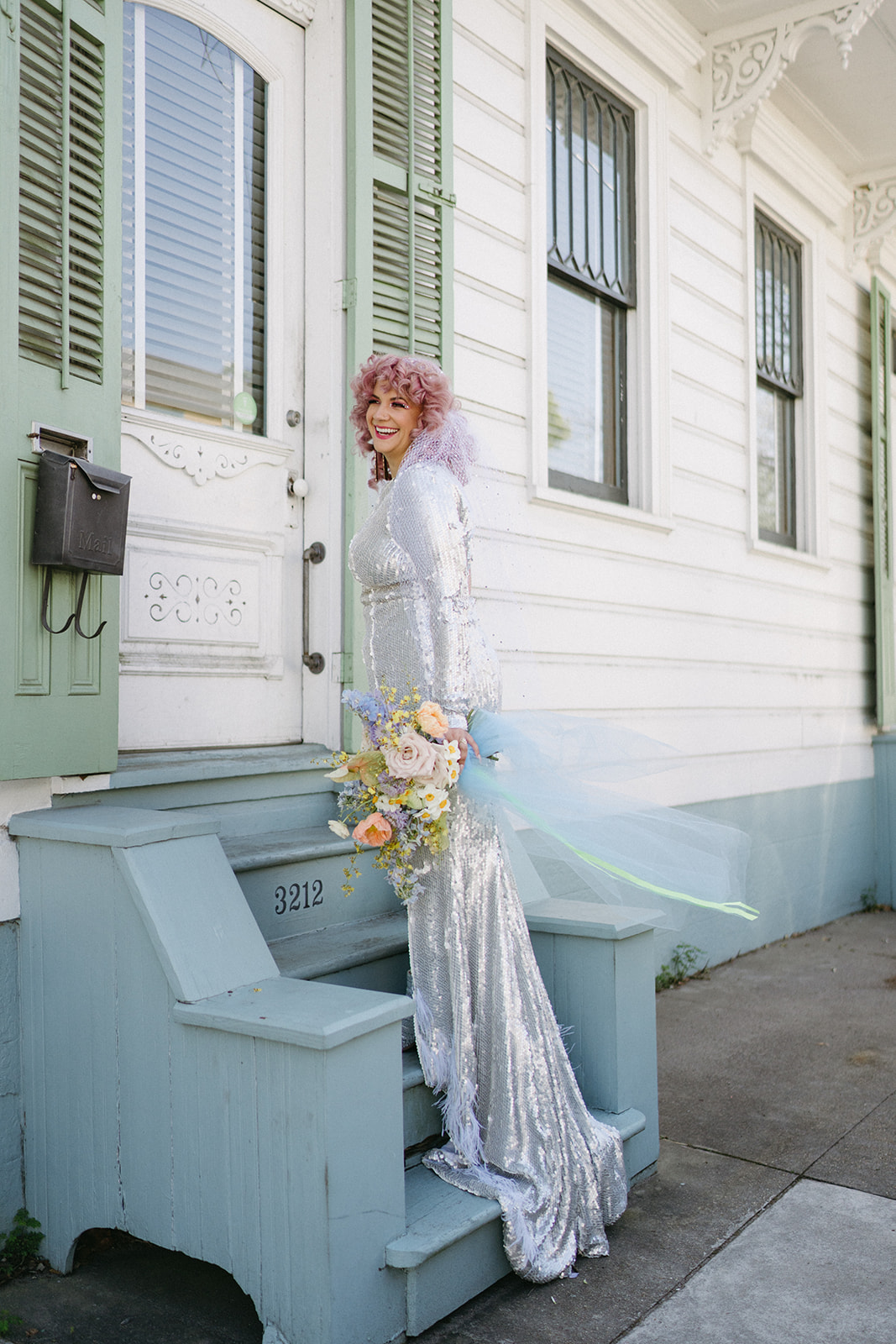 bride in new orleans with pink hair and silver sequin gown