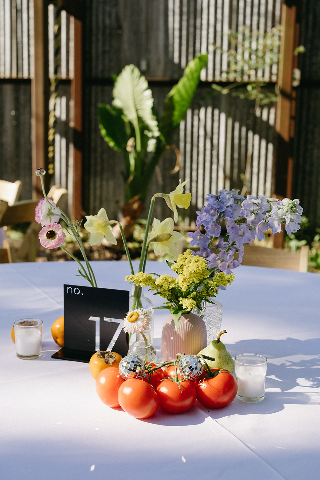 mix and match pastel wedding centerpieces with tomatoes