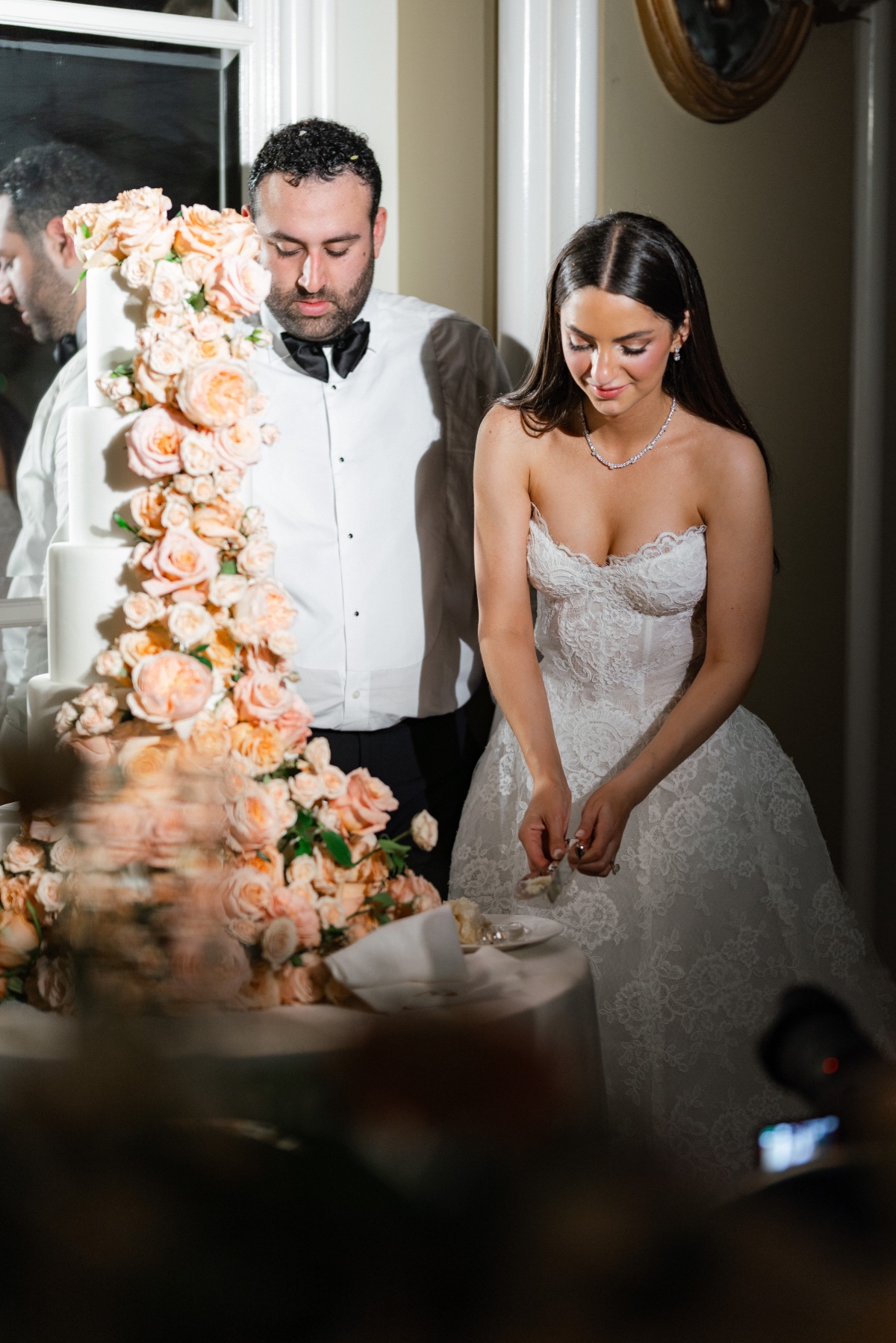 cascading peach floral wedding cake