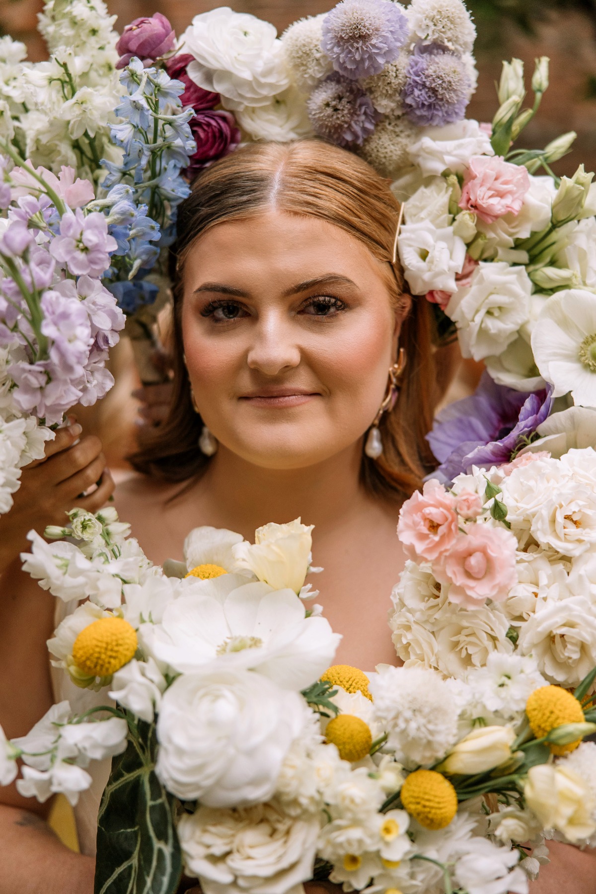 bridal portrait surrounded with flowers