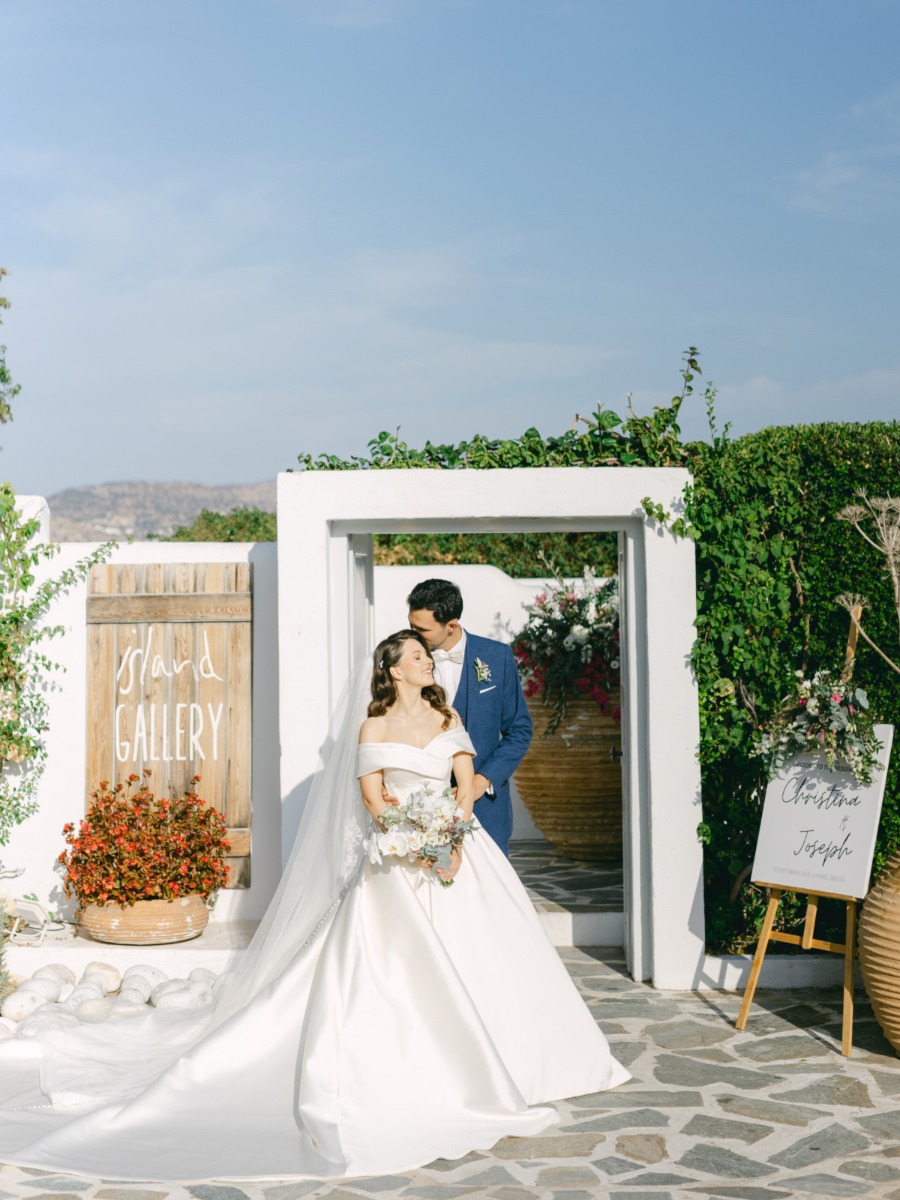 Pink florals cascaded down a little white church at Athens Riviera