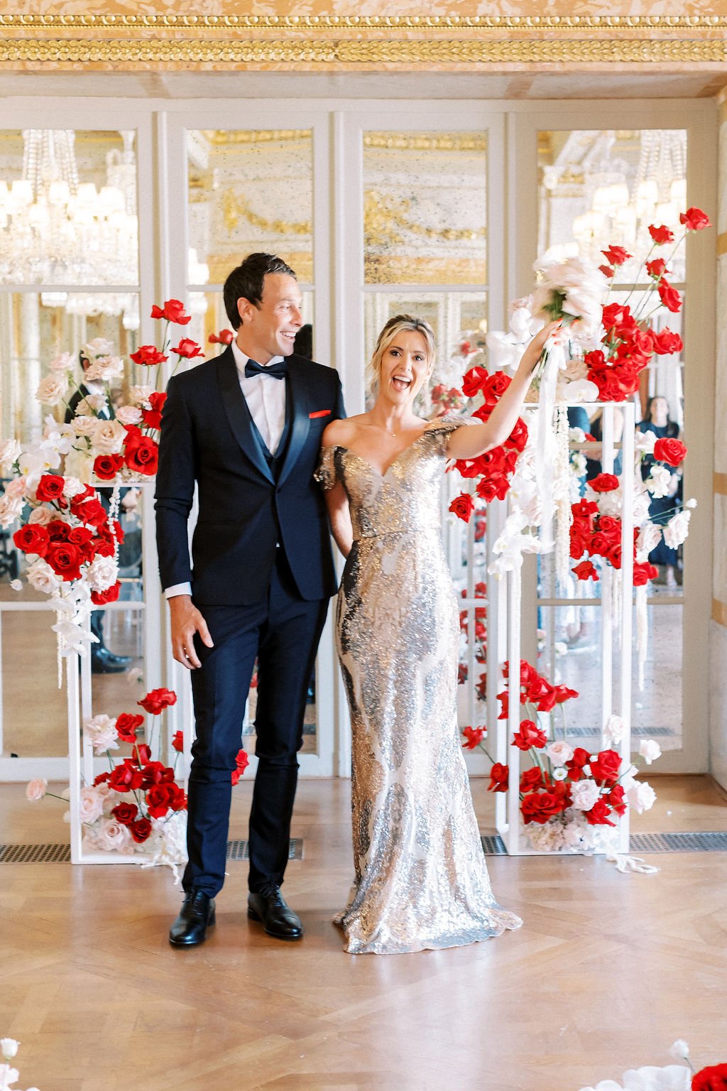 Romantic red and white rose ballroom wedding ceremony 