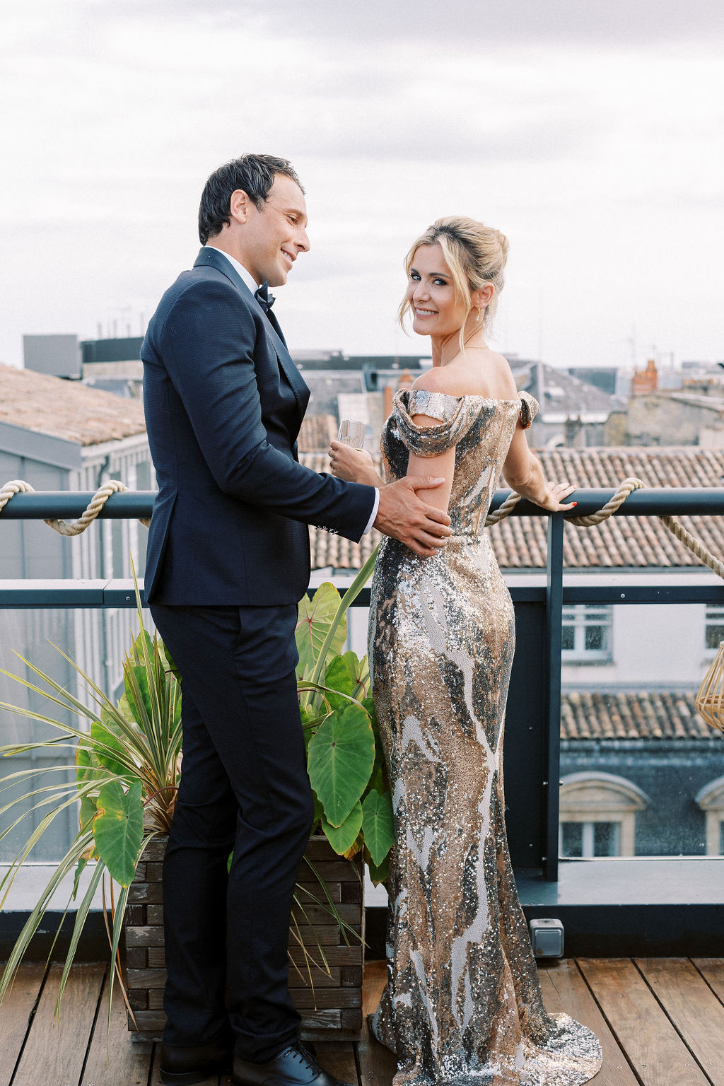 Luxury bride and groom at rooftop elopement in Bordeaux