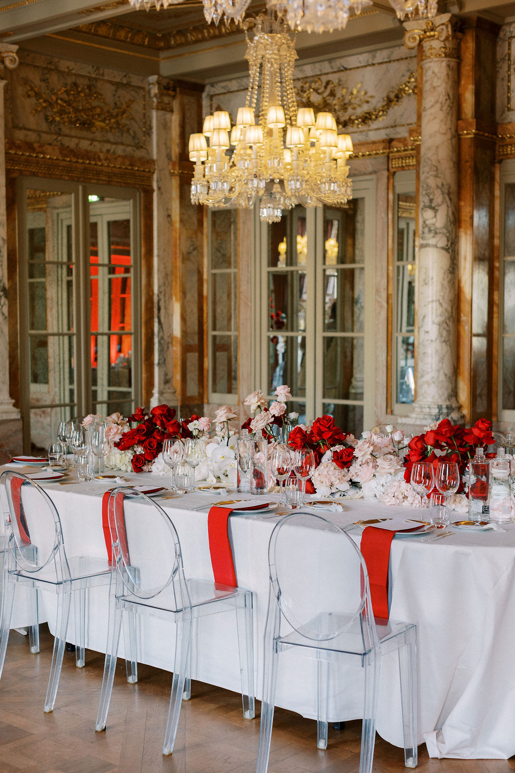 Modern and unique red and white wedding reception table 