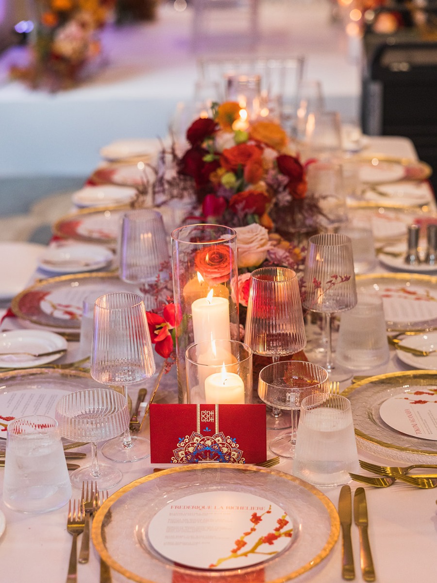 Lions danced at this Toronto wedding full of red and gold accents