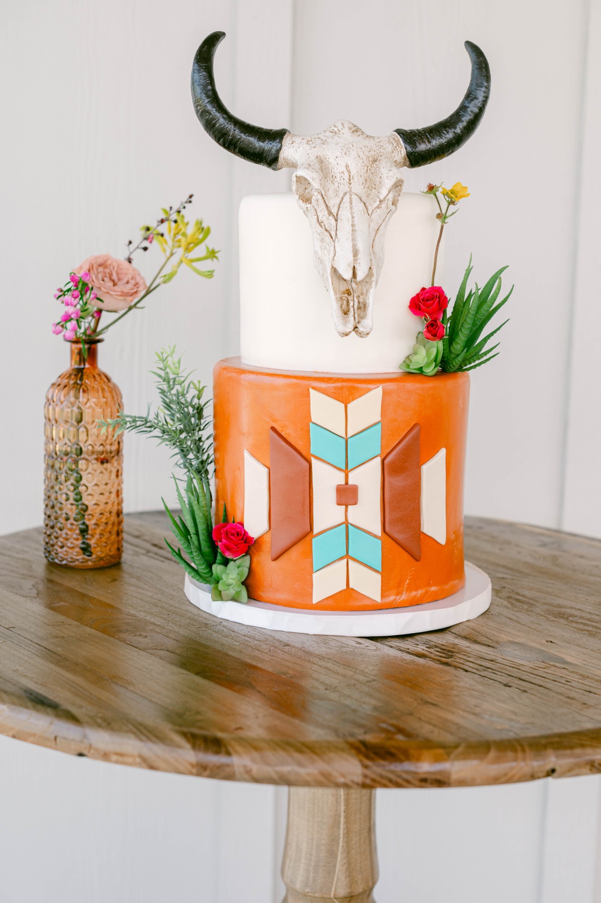 western-inspired wedding cake with skull