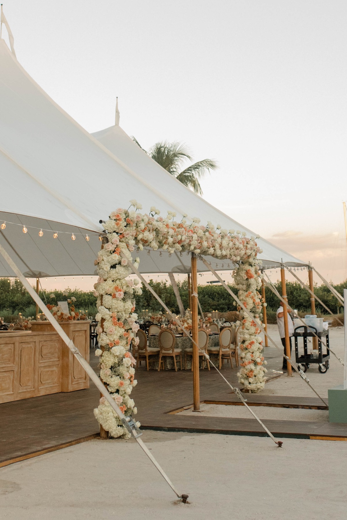 peach and white floral reception entryway