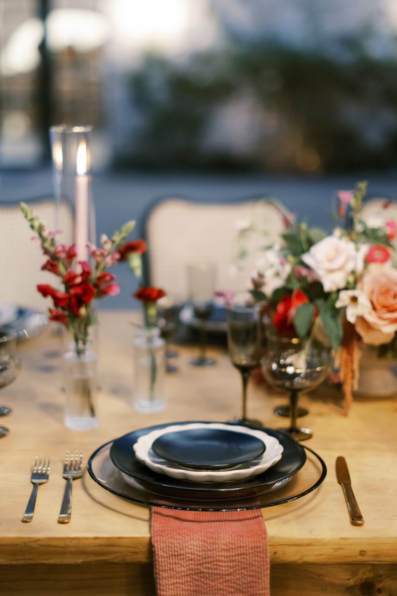 black glasses and plates for wedding