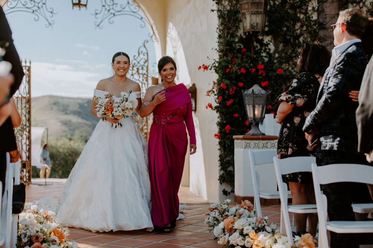 mob in magenta gown