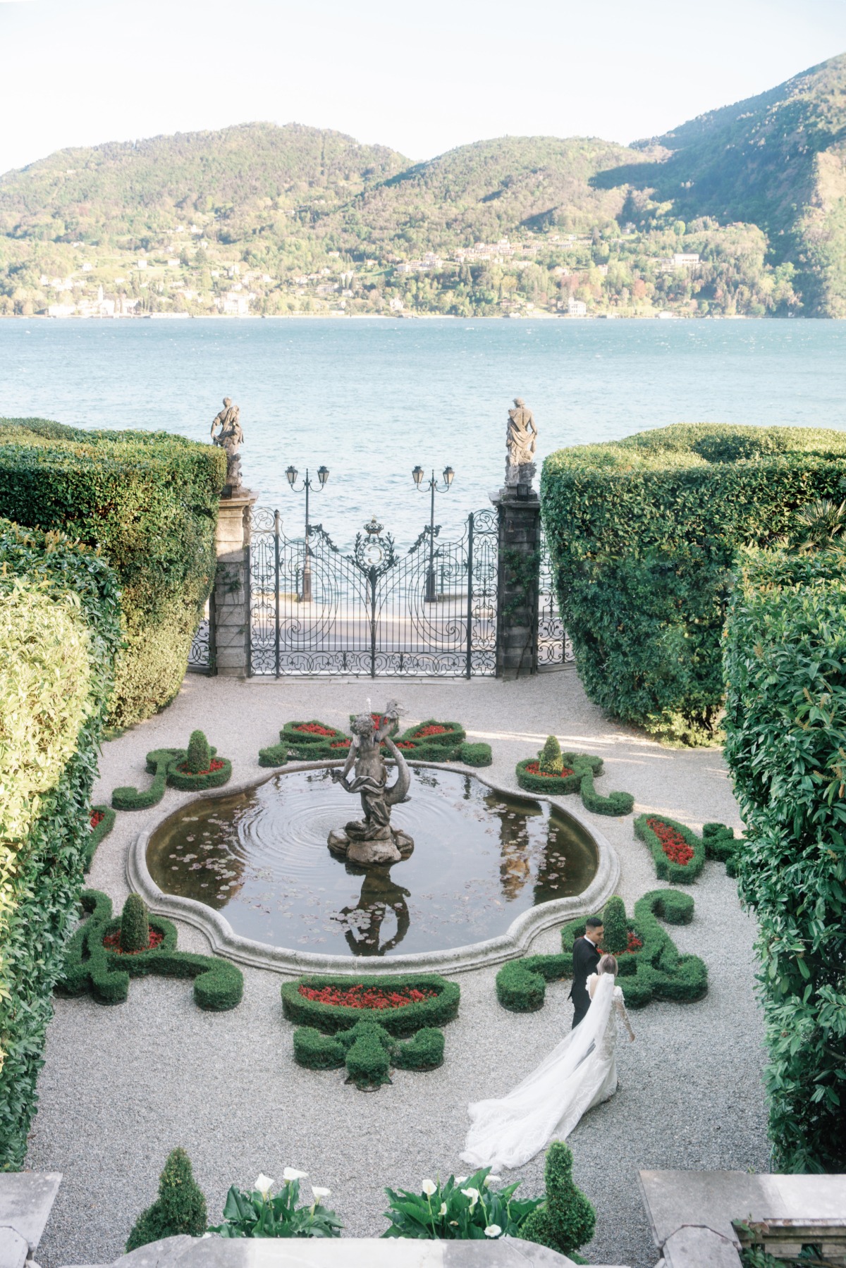 villa on lake como with ornate hedges