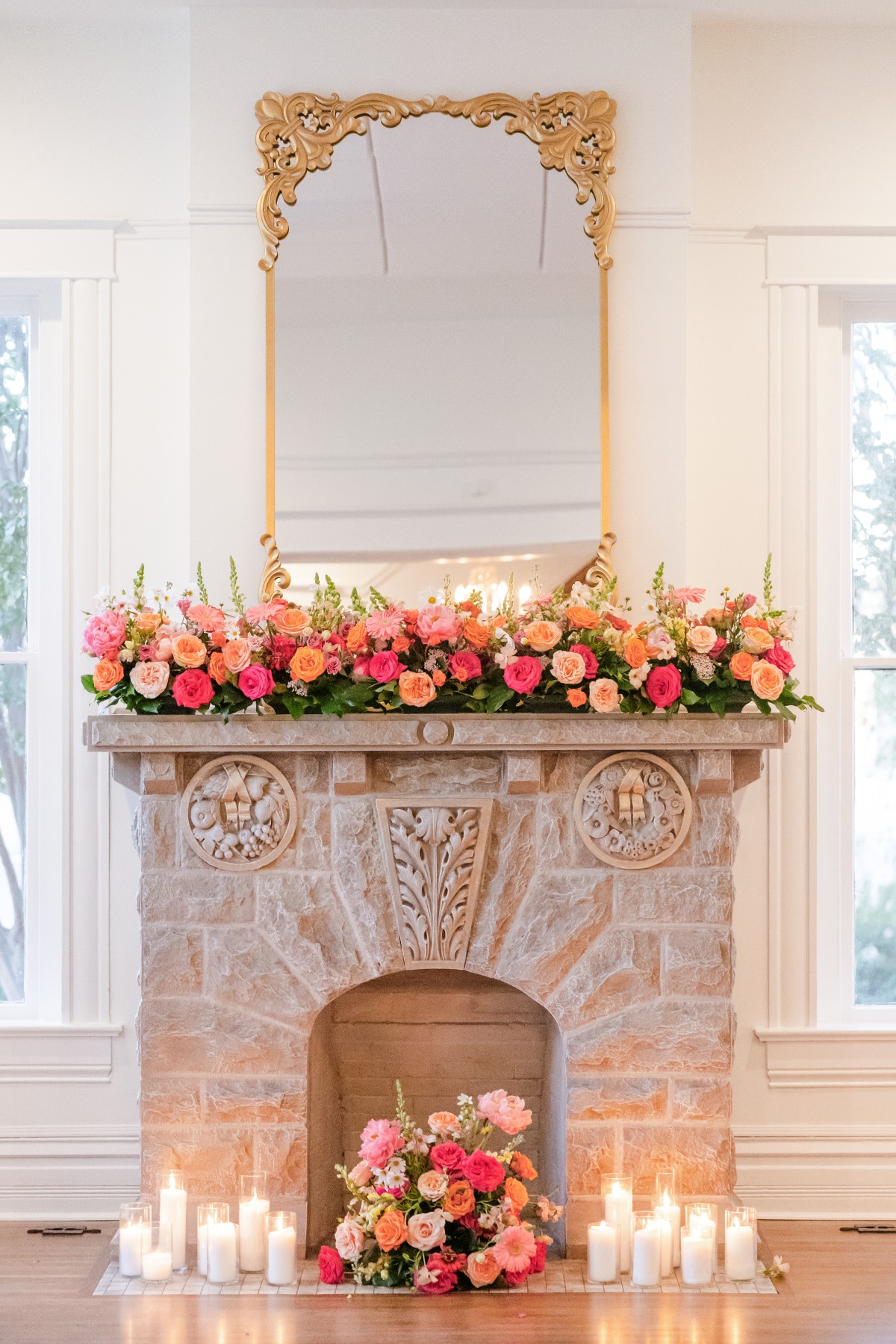 votives in front of wedding ceremony fireplace