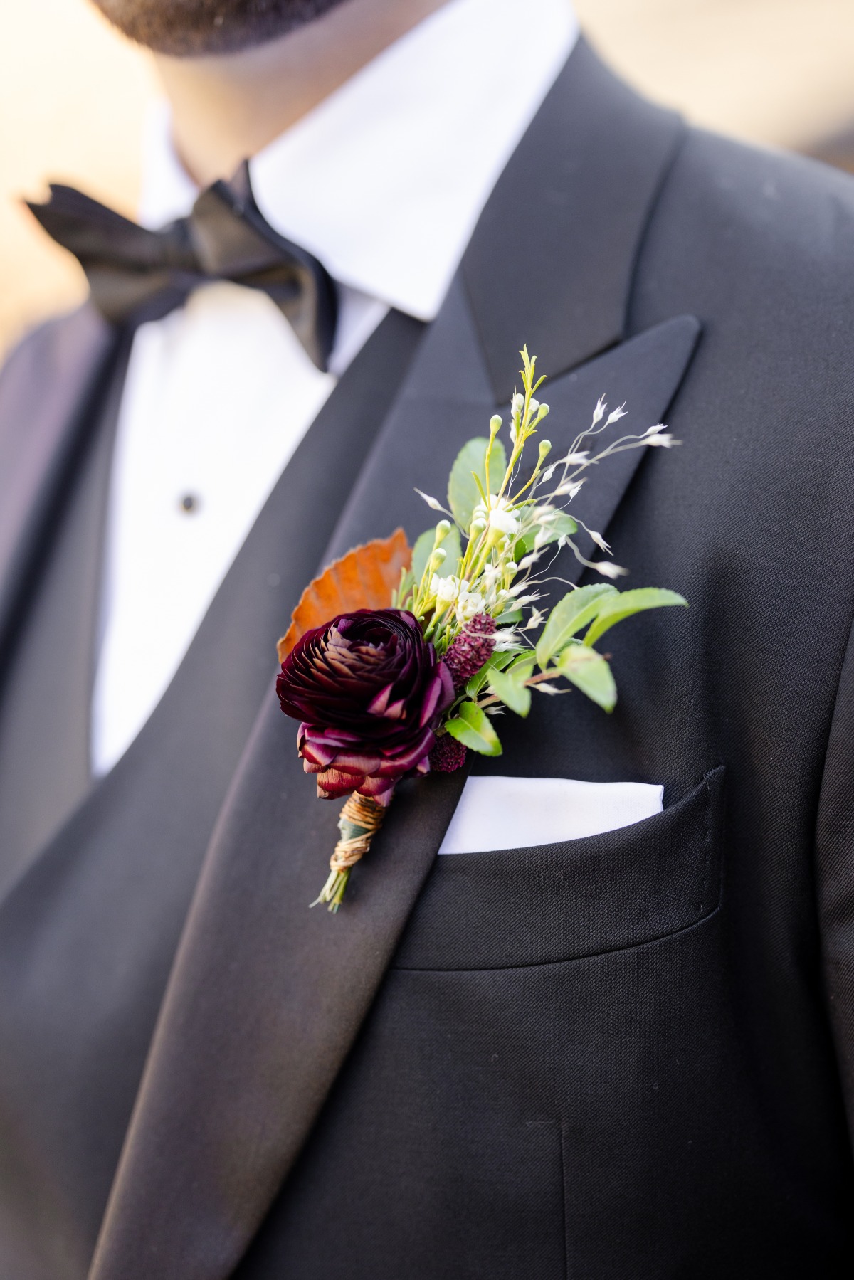 groom in tuxedo for outdoor wedding