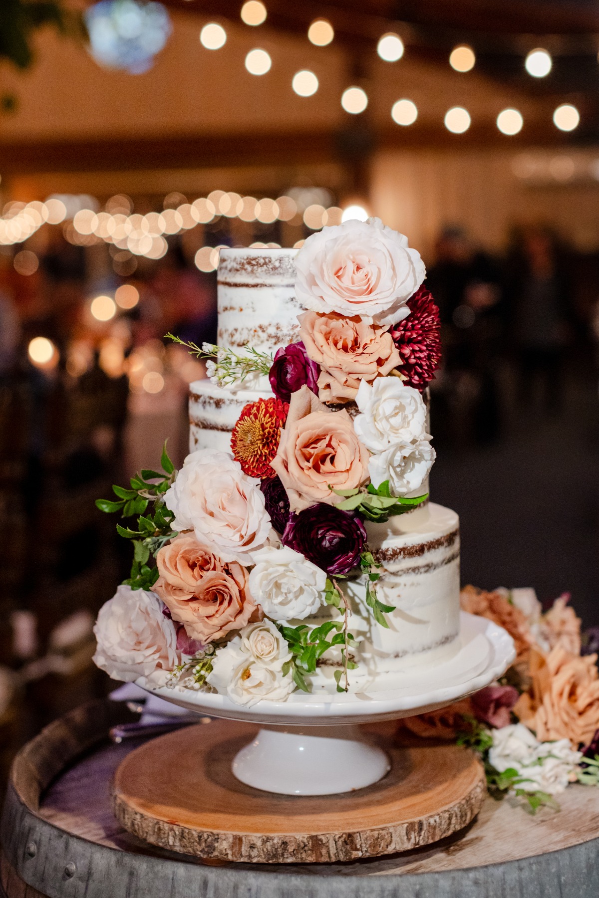 naked cake with fresh flowers