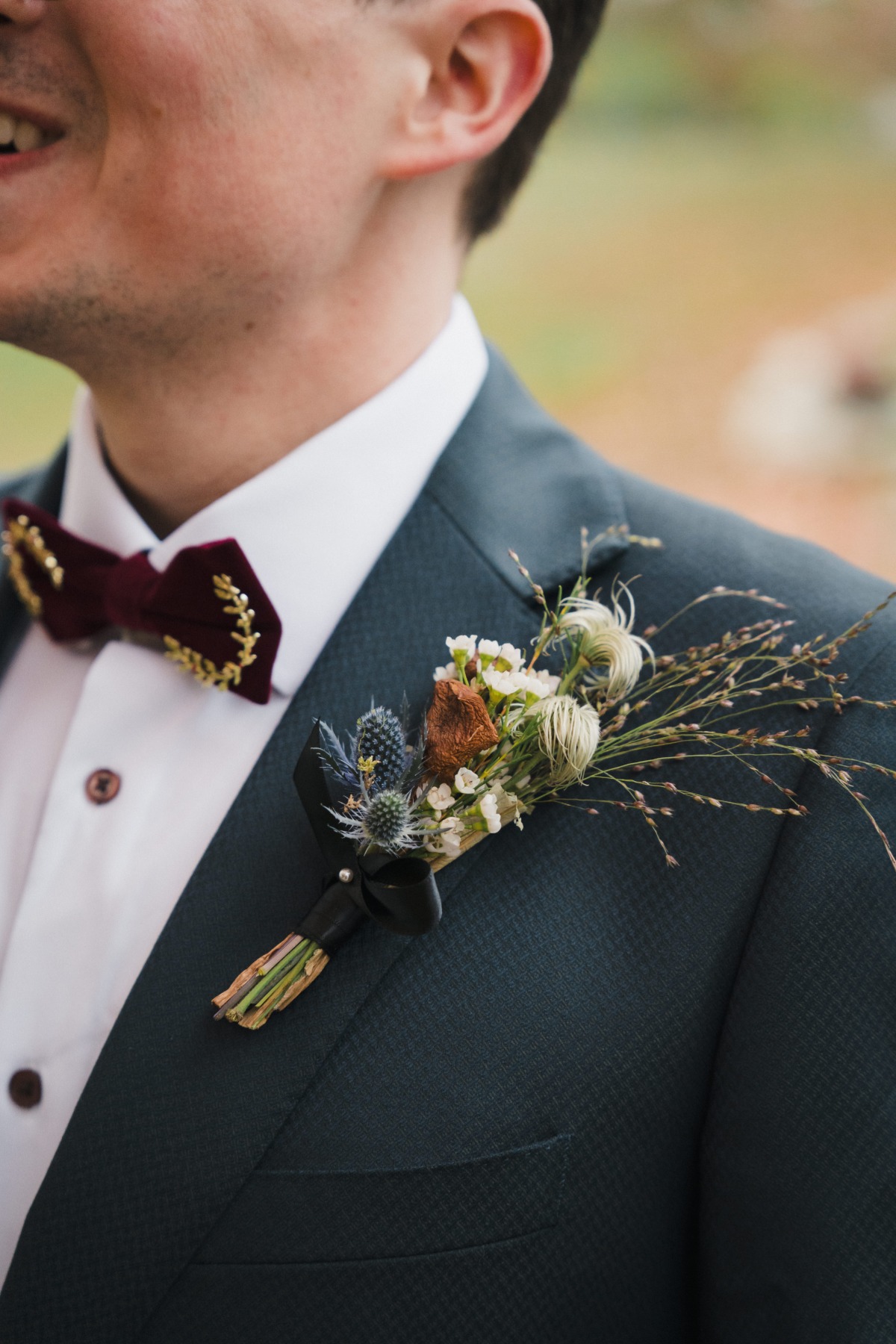 dried and wildflower boutonniere with thistle