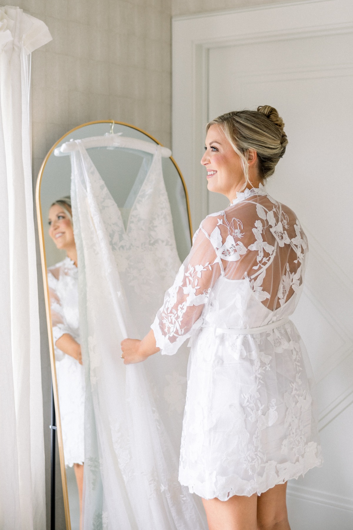 bride in lace robe and white night gown