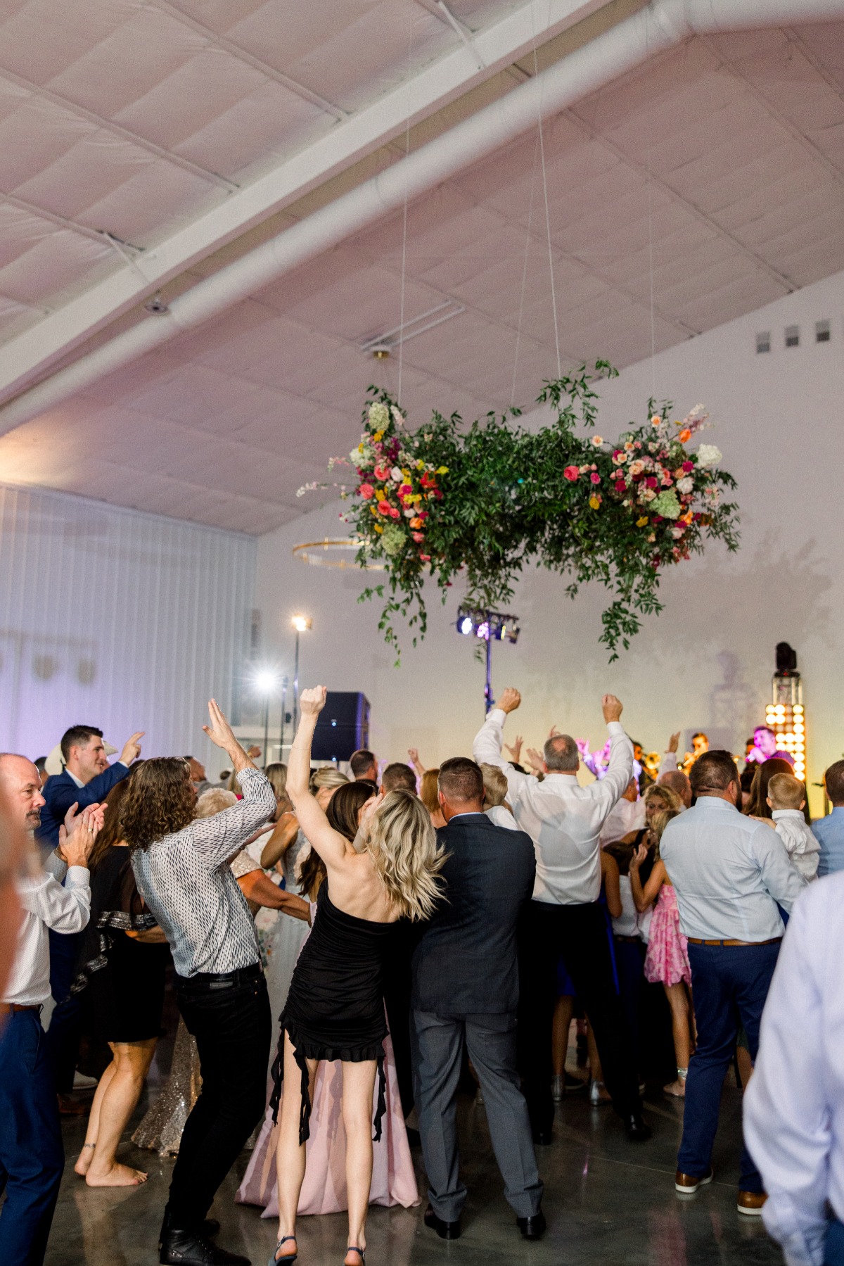 hanging floral arrangement for barn wedding