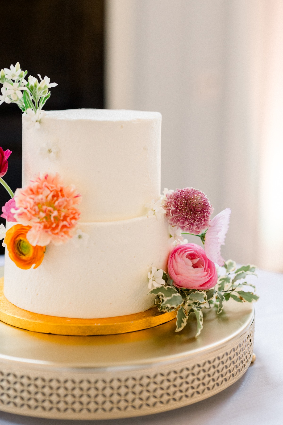 two tier simple buttercream wedding cake