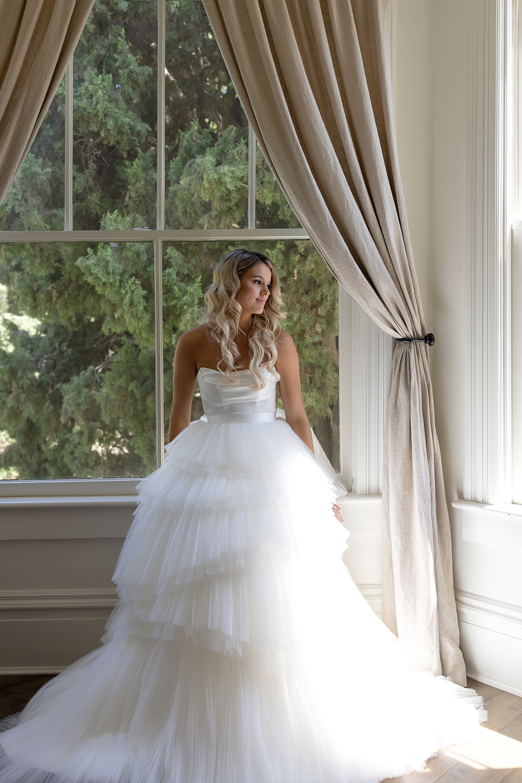 satin wedding gown with detachable tulle skirt
