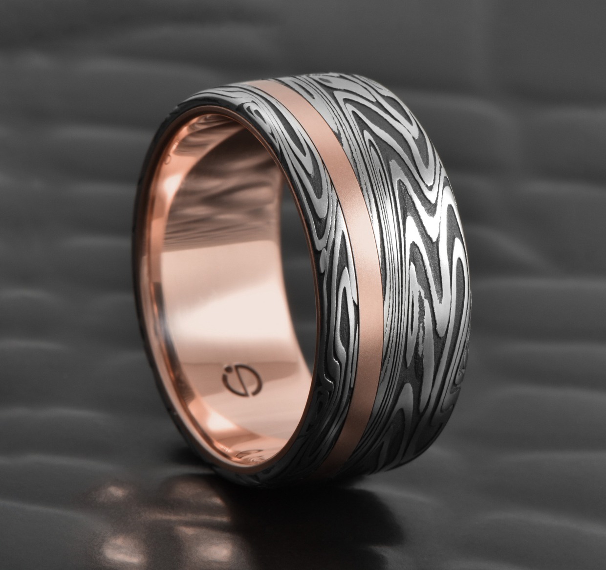 Damascus steel wedding ring by Gentlebands