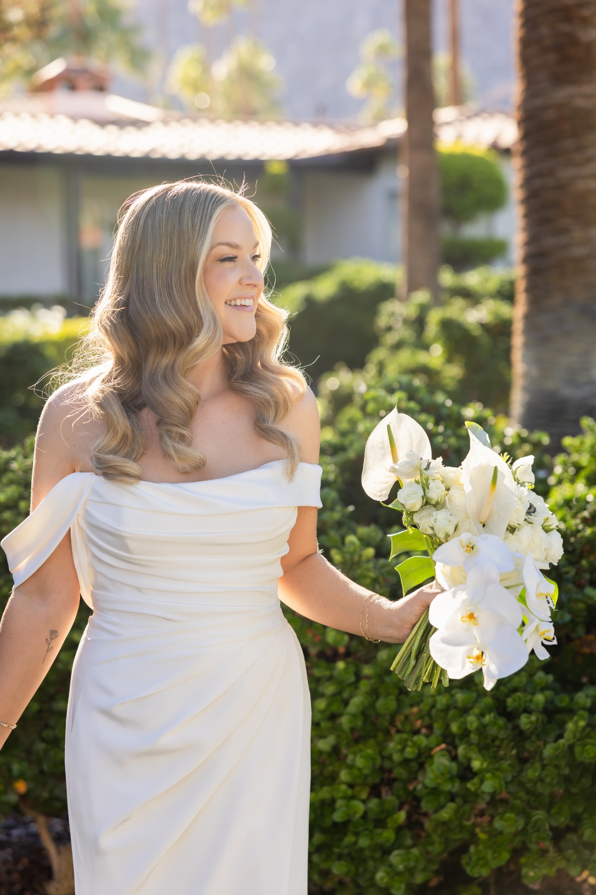 draped off the shoulder wedding gown