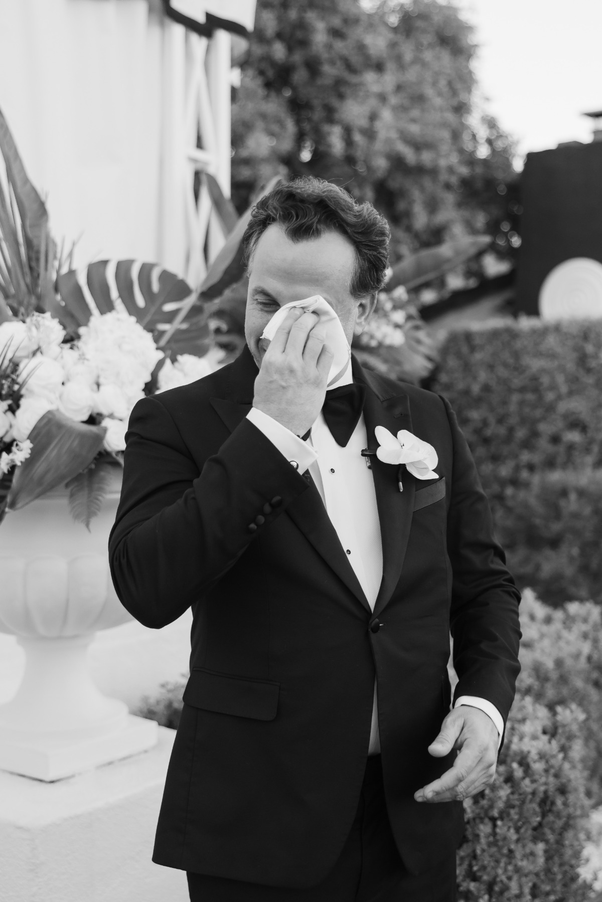 groom in black tie