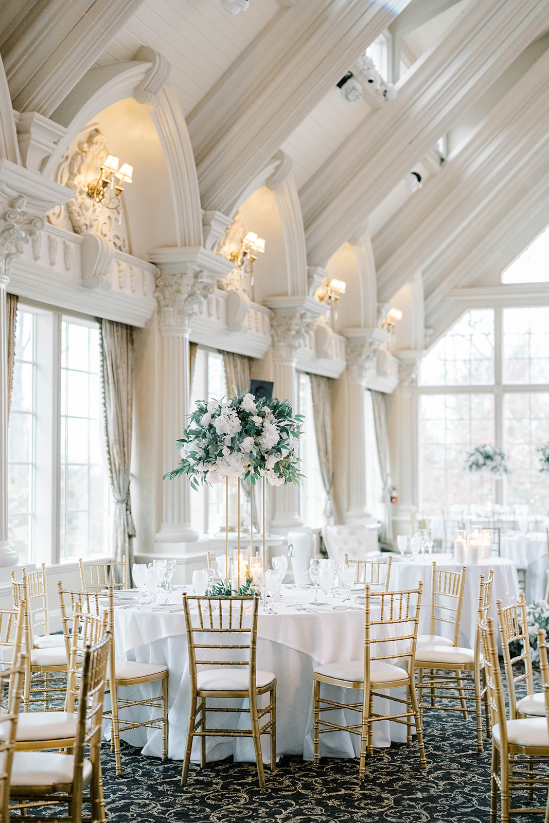 white and greenery centerpieces