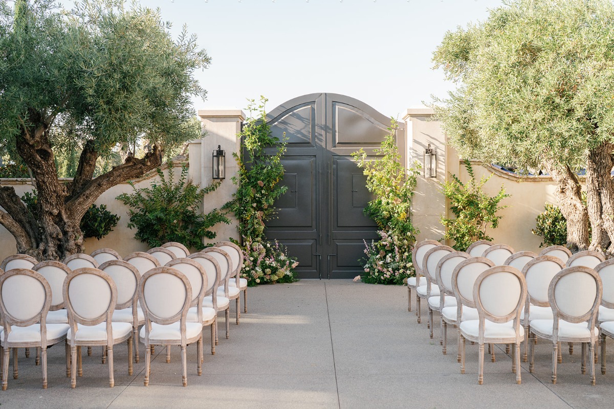 wedding floral arch on a gate