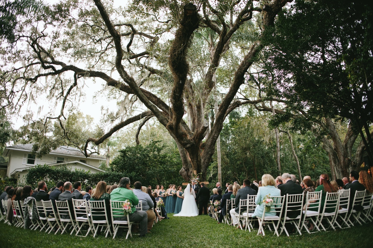 backyard wedding under large oak tree