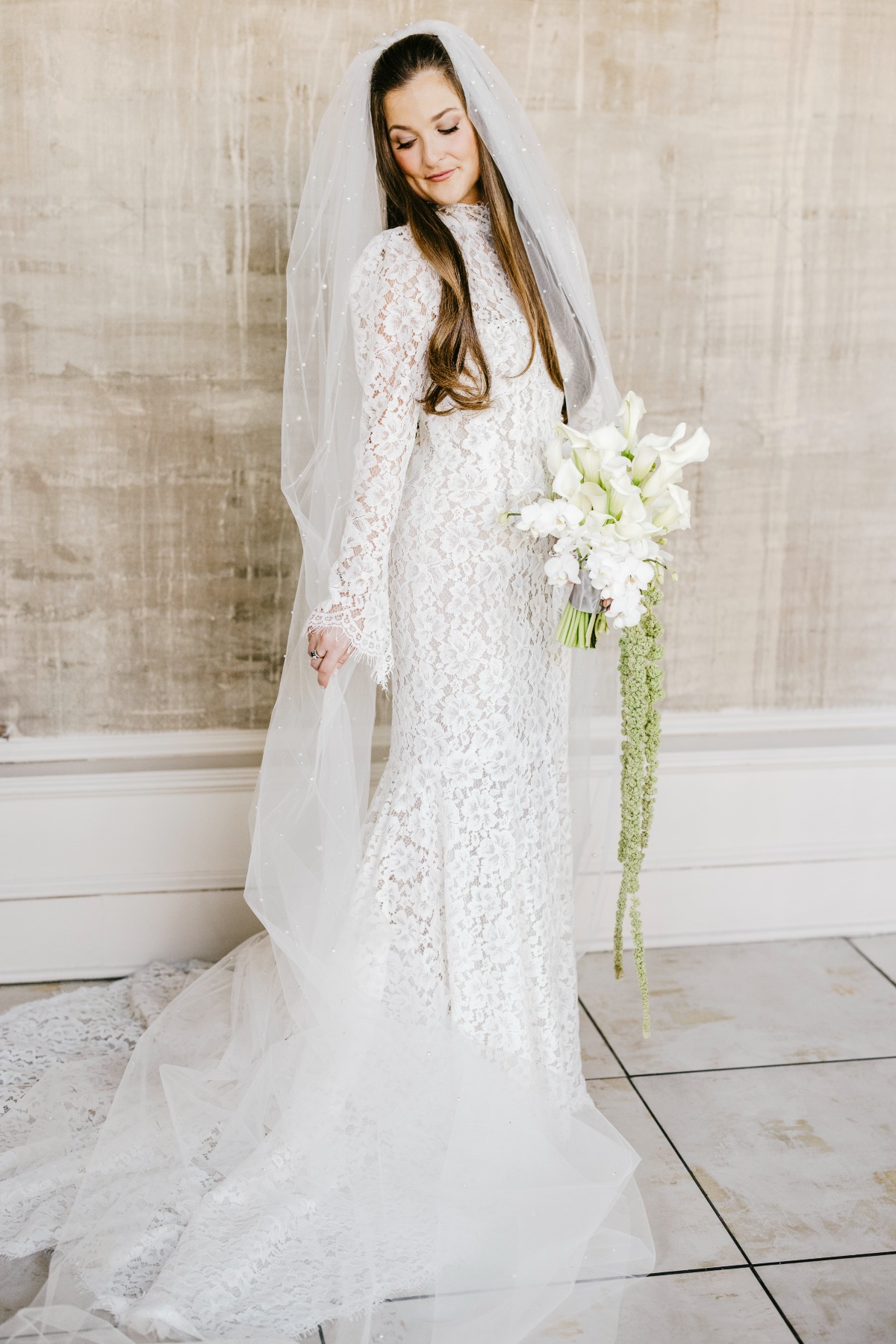 long sleeved lace wedding gown