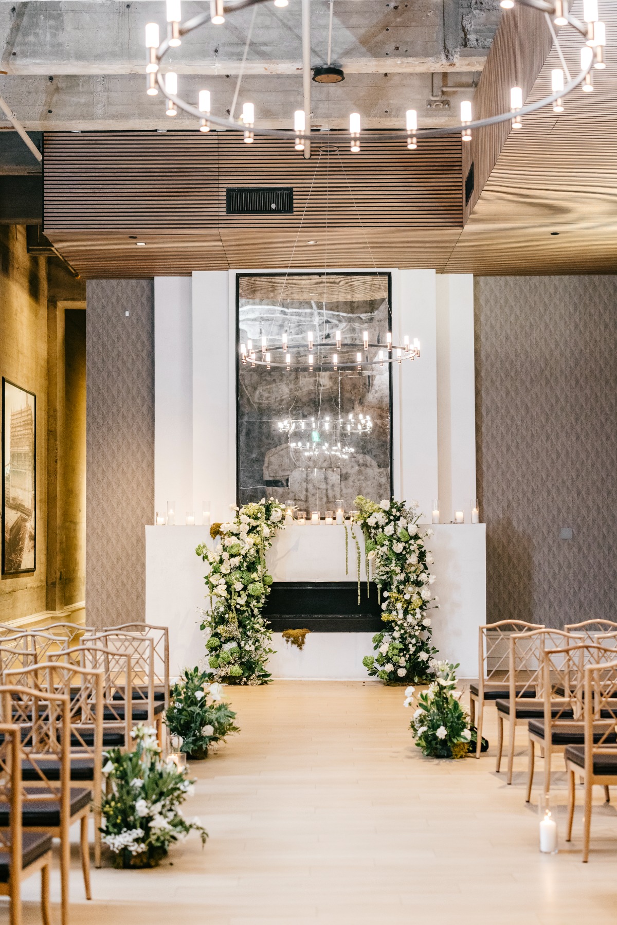 white flowers for indoor wedding ceremony