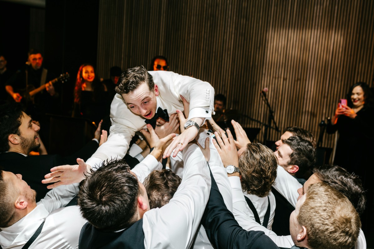 crowd surfing at wedding