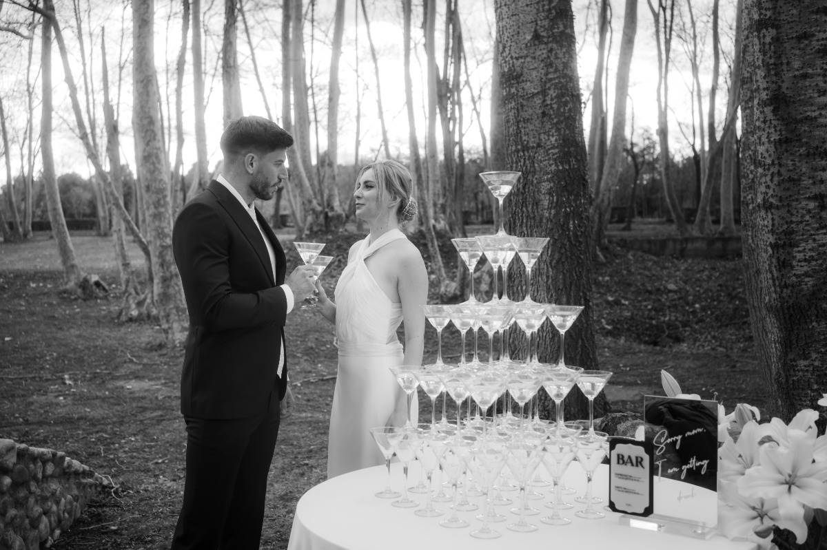bride and groom with martini tower