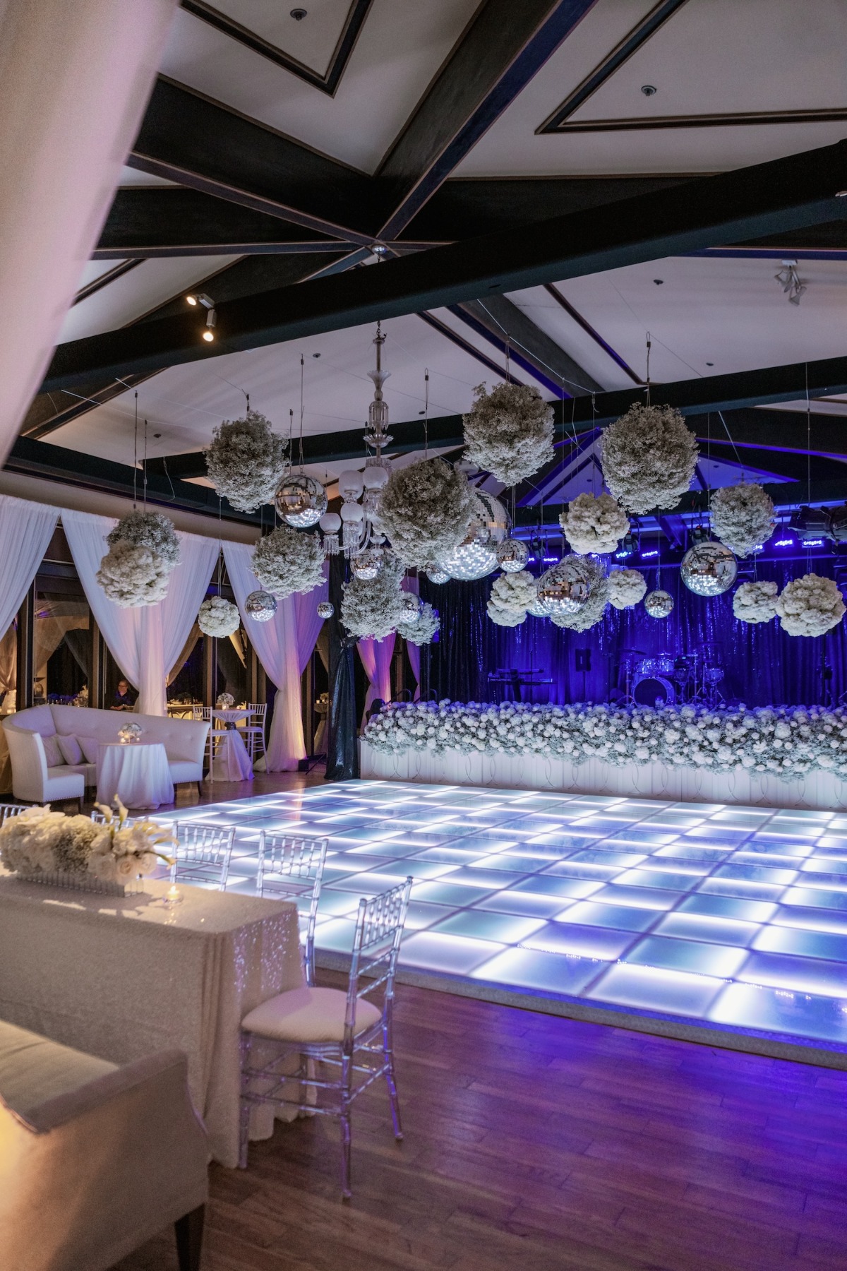 hanging baby's breath and disco ball installation