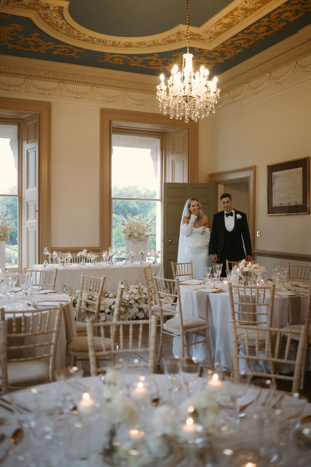 candlelit white wedding reception