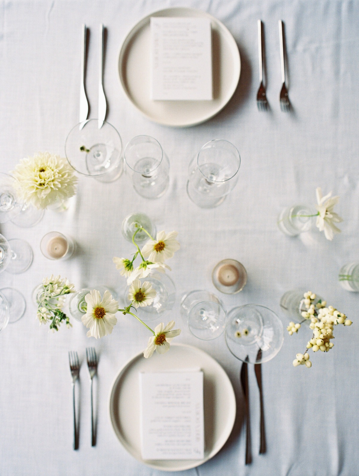 white and off-white reception tables