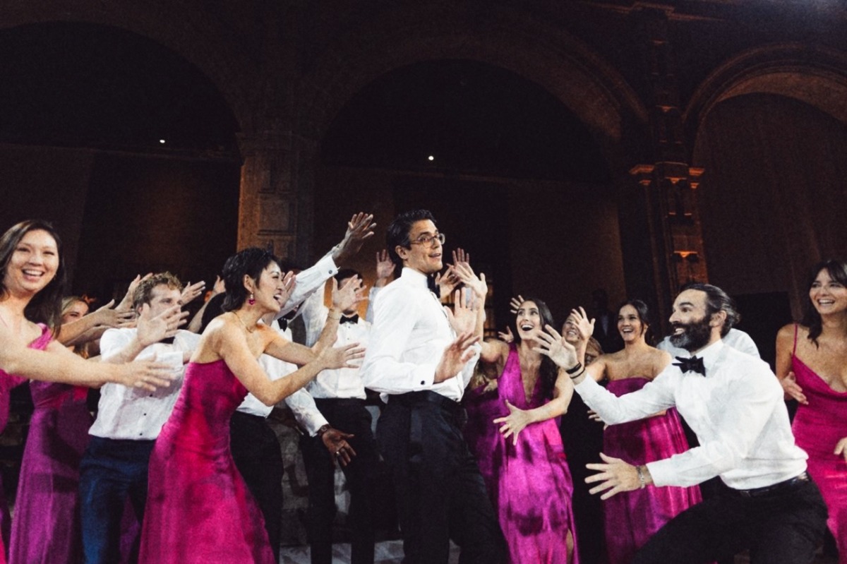 groom performs at wedding