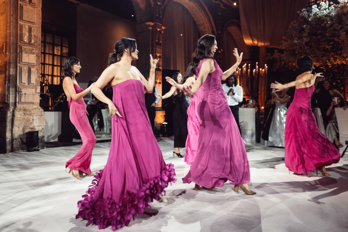 bridesmaids perform dance at wedding