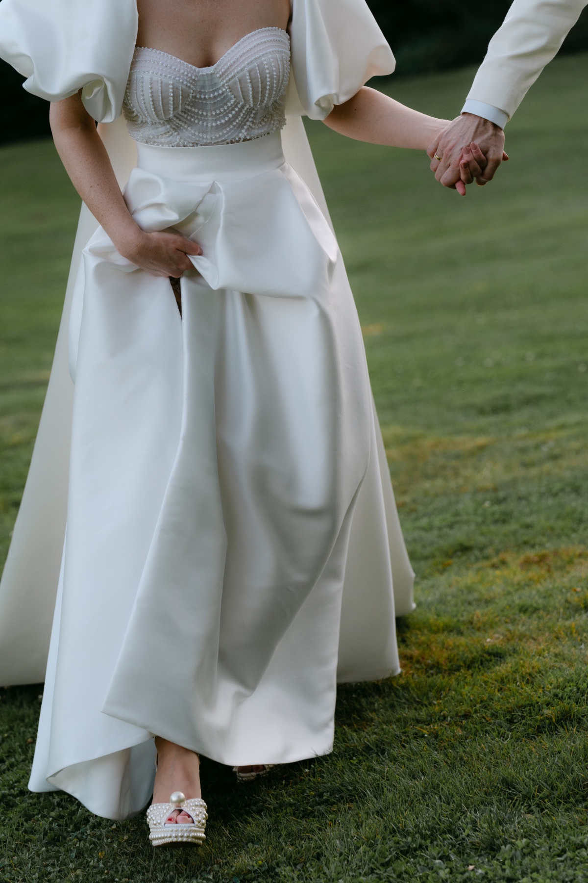 beaded strapless wedding dress with detachable poof sleeves and cape