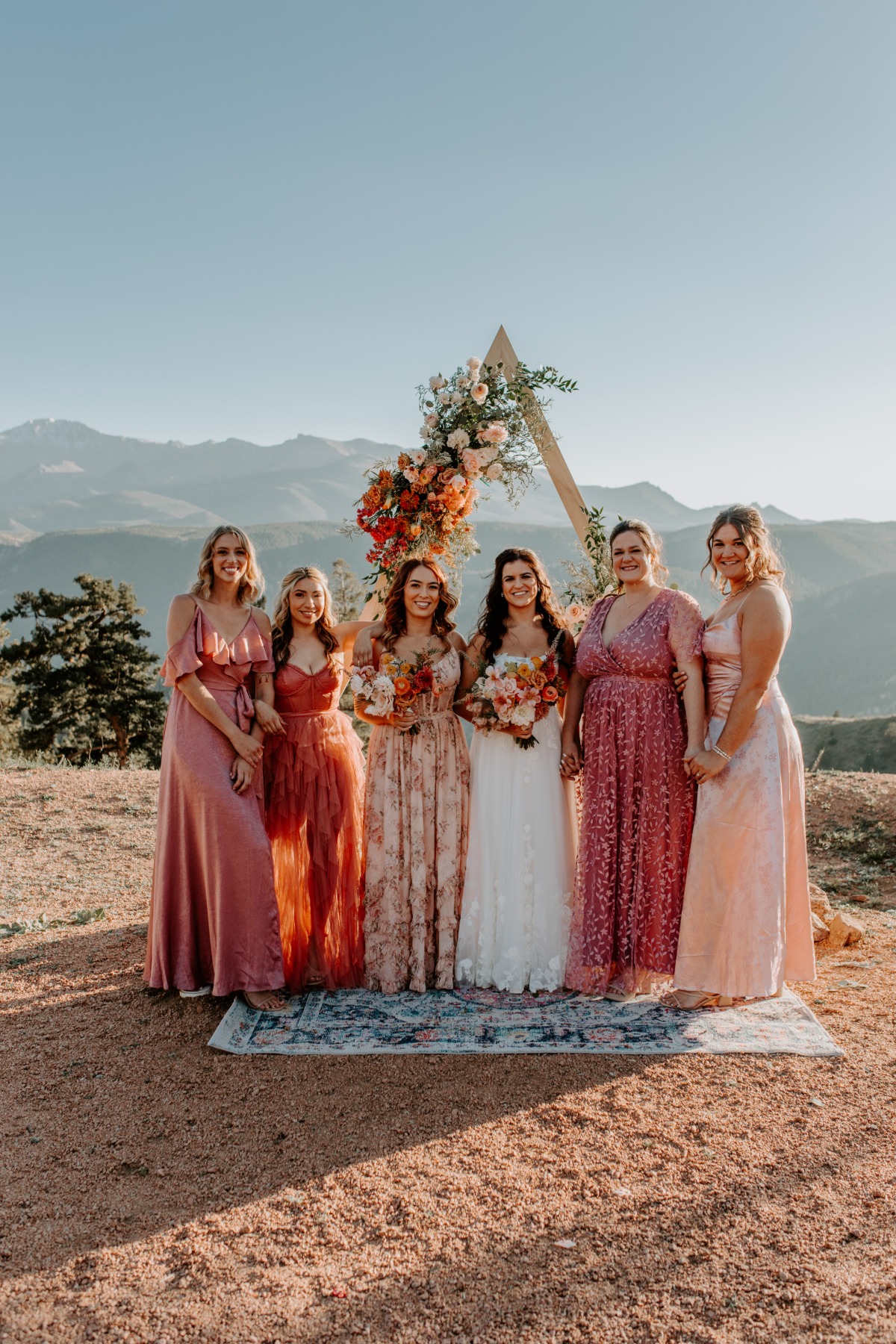 shades of pink patterned bridesmaid dresses