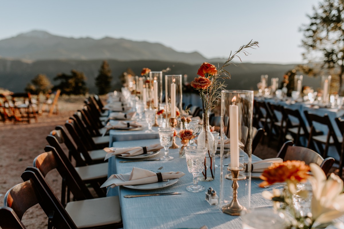 blue tablecloths with terracotta centerpieces