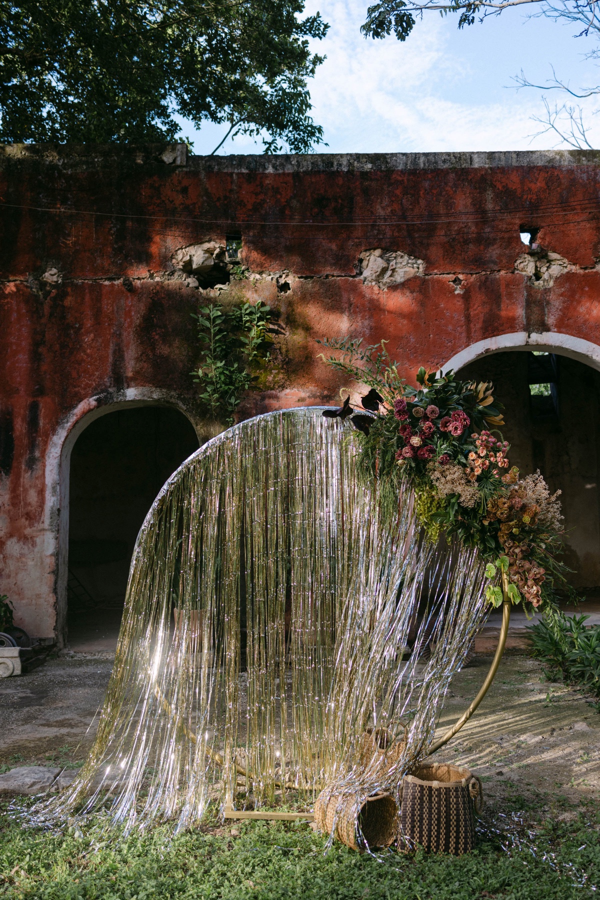 gold streamer wedding ceremony backdrop