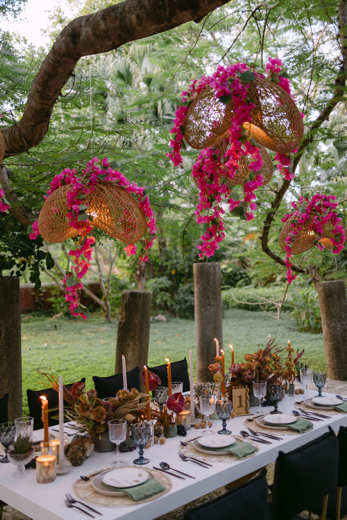 moody tropical wedding reception centerpieces