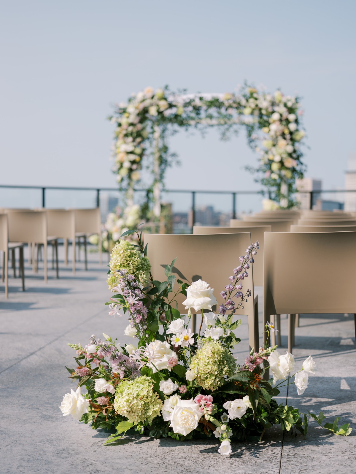 flower arrangement for wedding ceremony aisle