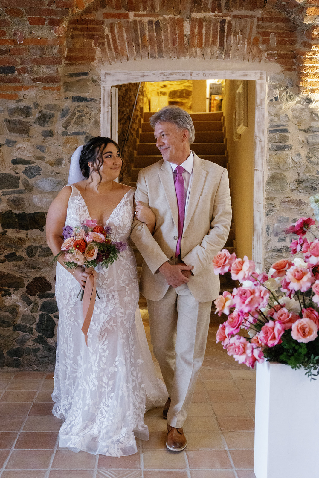 tan suit with purple tie for wedding