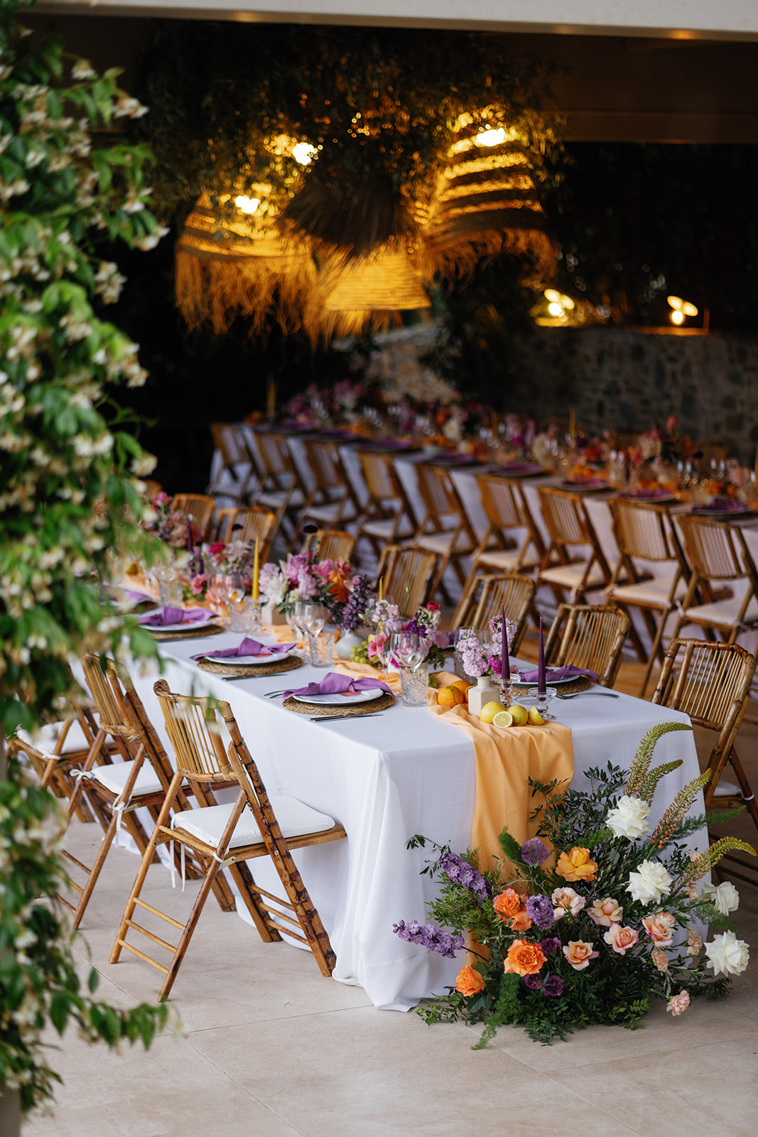 purple and yellow citrus wedding reception decor