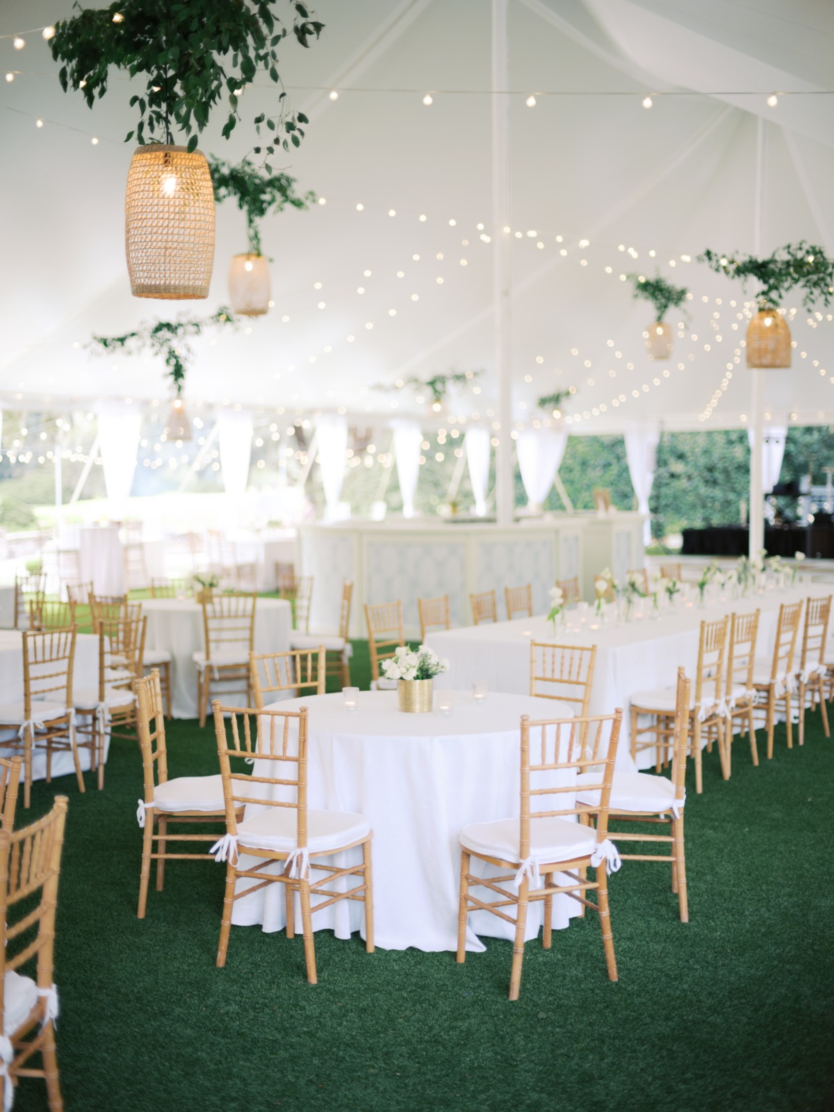 tented reception with vines