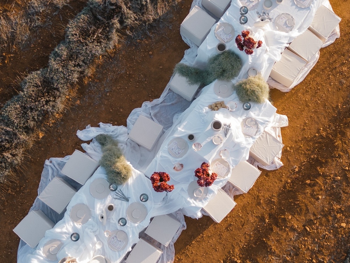 overhead shot of table with white tablecloth